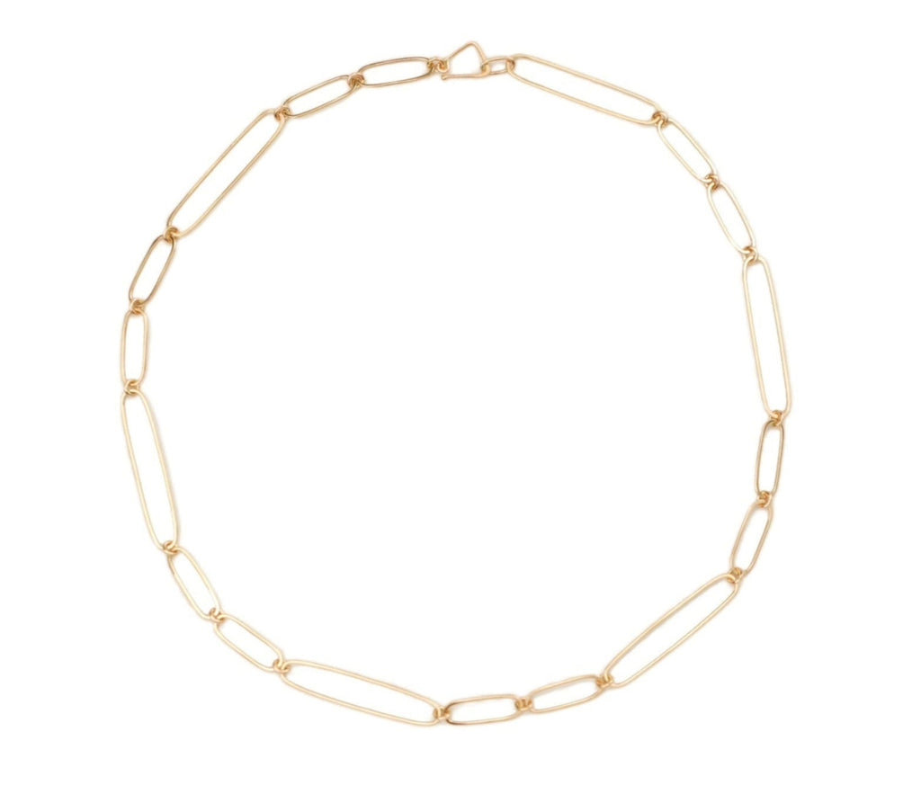 Gold chain necklace on a white background