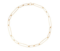 Gold chain necklace on a white background